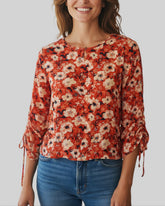 Chemise fleurie rouge – taille 38/40 – seconde main femme