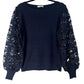 Pull marque X-Max