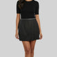 Mini-jupe  noire  Nafnaf
